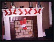 Slide of Christmas stockings in Alpha Phi Omega house